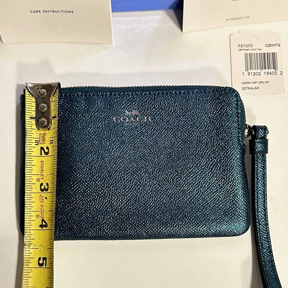 Coach teal pebbled wristlet
